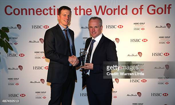 Nick Oakley , IMG Golf Event Manager, presents the inaugural HSBC Golf Business Community Innovation Award to Tony Judge, Chief Executive of...