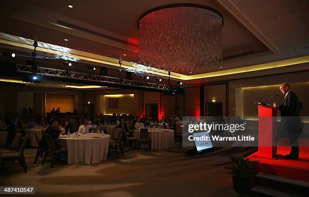 Guy Kinnings , Global Head of Golf IMG addresses the 2014 HSBC Golf Business Forum at The Westin Hotel at Abu Dhabi Golf Club on April 30, 2014 in...