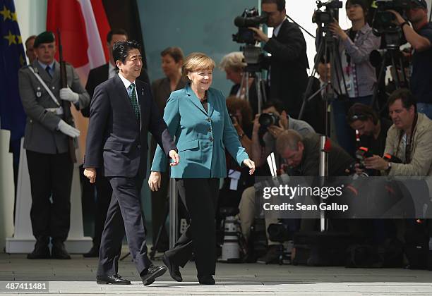 German Chancellor Angela Merkel welcomes Japanese Prime Minister Shinzo Abe at the Chancellery on April 30, 2014 in Berlin, Germany. The two leaders...