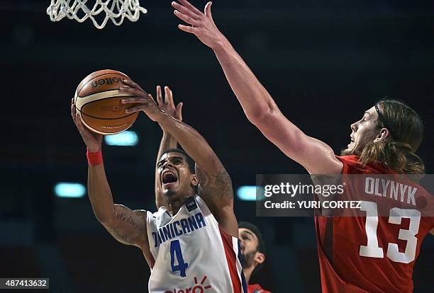 Dominican Republic's point guard Edgar Sosa disputes the ball with Canada's power forward Kelly Olynyk during their 2015 FIBA Americas Championship...