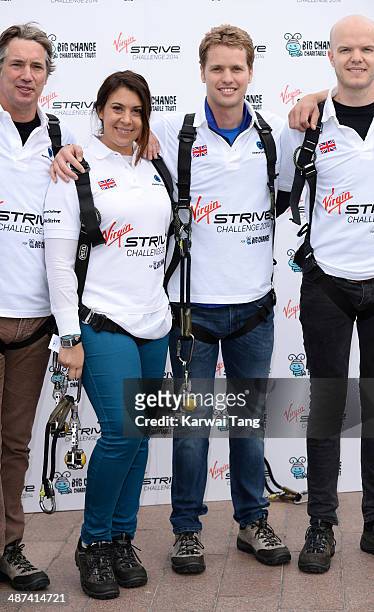 Marion Bartoli and Sam Branson attend a photocall to launch the Virgin STRIVE Challenge held at the 02 Arena on April 30, 2014 in London, England.