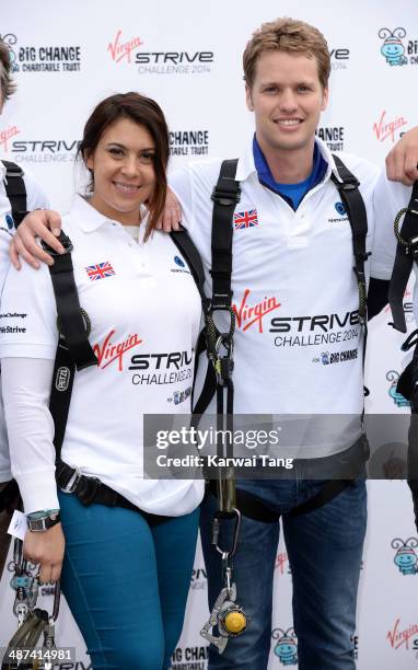 Marion Bartoli and Sam Branson attend a photocall to launch the Virgin STRIVE Challenge held at the 02 Arena on April 30, 2014 in London, England.