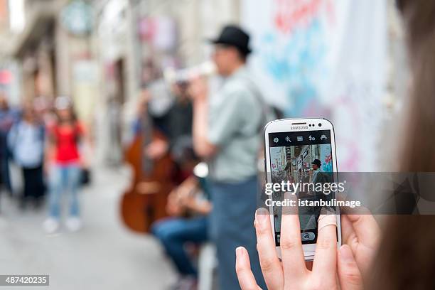 musicians playing at istiklal street,istanbul - samsung stock pictures, royalty-free photos & images