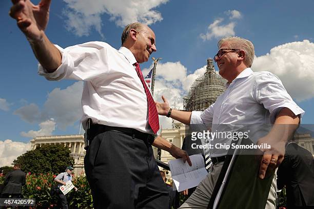 Conservative pundit Glenn Beck embraces Rep. Louie Gohmert before taking the stage during a rally against the Iran nuclear deal on the West Lawn of...