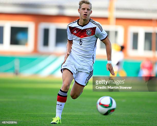 Tom Baack of U17 Germany plays the ball during the match between U17 Germany v U17 Italy at Weserstadion "Platz 11" on September 9, 2015 in Bremen,...