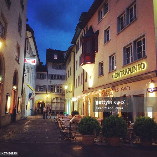 zurich street at night - zurich cafe stock pictures, royalty-free photos & images