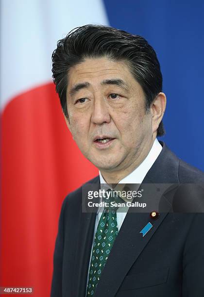Japanese Prime Minister Shinzo Abe and German Chancellor Angela Merkel speak to the media following talks at the Chancellery on April 30, 2014 in...
