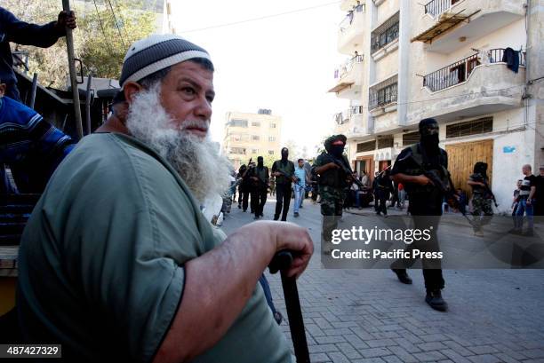 Palestinian militants from the Popular Front for the Liberation of Palestine stage a parade in Khan Yunis in the southern Gaza Strip.