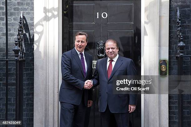 British Prime Minister David Cameron greets Prime Minister of Pakistan Muhammad Nawaz Sharif in Downing Street on April 30, 2014 in London, England....