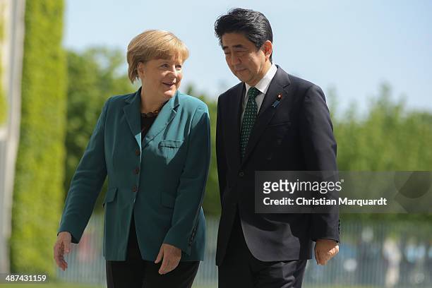 German Chancellor Angela Merkel welcomes the Japanese Prime Minister Shinzo Abe at the Chancellory on April 30, 2014 in Berlin, Germany. The two...