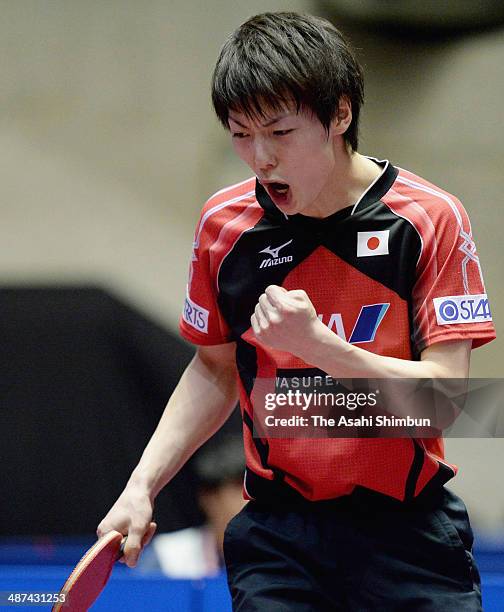 Kenta Matsudaira of Japan celebrates a point during the game against Simon Gauzy of France during three of the 2014 World Team Table Tennis...