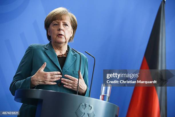 German Chancellor Angela Merkel speaks to the media following talks at the Chancellery on April 30, 2014 in Berlin, Germany. The two leaders are...