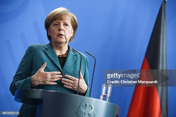 German Chancellor Angela Merkel speaks to the media following talks at the Chancellery with Japanese Prime Minister Shinzo Abe on April 30, 2014 in...