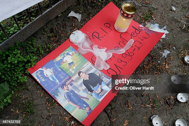 Tributes are left in memory of Diren Dede outside his local football club, SC Teutonia 1910, on April 30, 2014 in Hamburg, Altona, Germany. German...