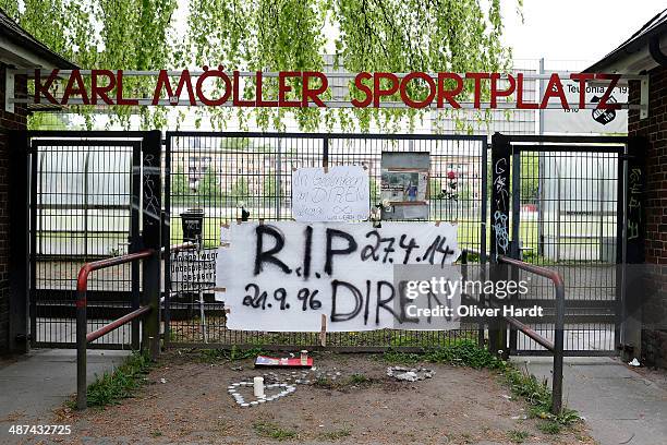 Tributes are left in memory of Diren Dede outside his local football club, SC Teutonia 1910, on April 30, 2014 in Hamburg, Altona, Germany. German...