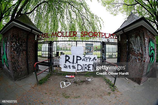 Tributes are left in memory of Diren Dede outside his local football club, SC Teutonia 1910, on April 30, 2014 in Hamburg, Altona, Germany. German...