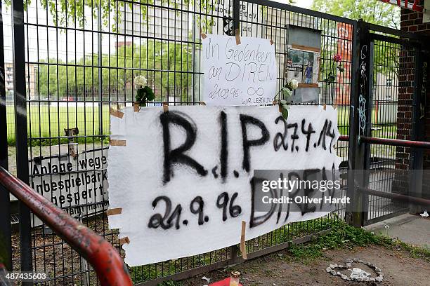 Tributes are left in memory of Diren Dede outside his local football club, SC Teutonia 1910, on April 30, 2014 in Hamburg, Altona, Germany. German...