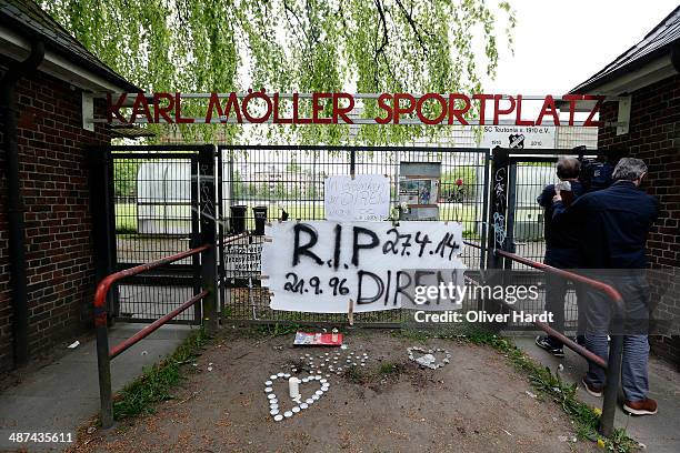 Tributes are left in memory of Diren Dede outside his local football club, SC Teutonia 1910, on April 30, 2014 in Hamburg, Altona, Germany. German...
