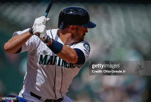 John Buck of the Seattle Mariners bats against the Texas Rangers at Safeco Field on April 27, 2014 in Seattle, Washington.