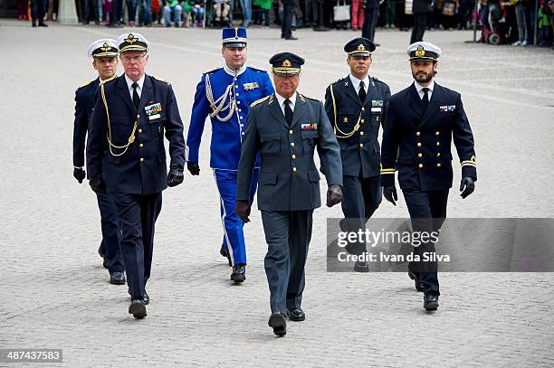 King Carl XVI Gustaf of Sweden & Prince Carl Philip attend the birthday cermony of King Carl XVI Gustaf of Sweden at the Royal Palace on April 30,...