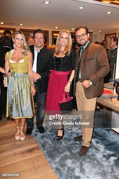Francis Fulton Smith and his wife Verena Klein, Christina Surer and Alexander Gutierrez Diaz during a cocktail reception hosted by Lodenfrey and...