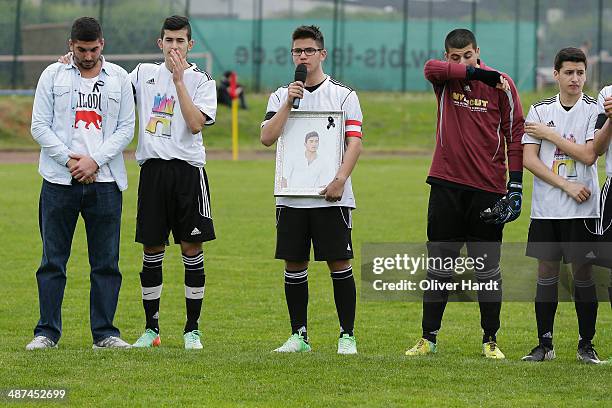 Team-mates, friends and relatives gather to remember Diren Dede at his football club, SC Teutonia 1910, on April 30, 2014 in Hamburg, Germany. German...