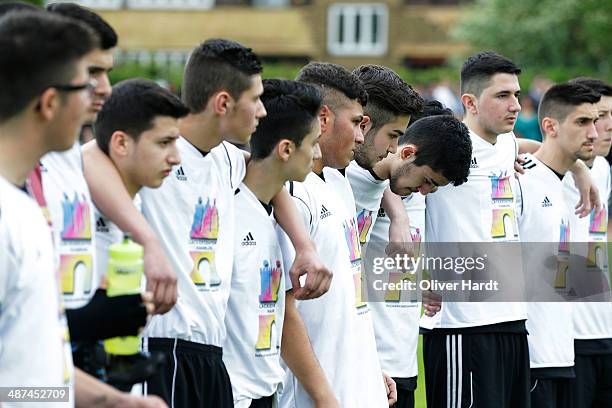 Team-mates, friends and relatives gather to remember Diren Dede at his football club, SC Teutonia 1910, on April 30, 2014 in Hamburg, Germany. German...