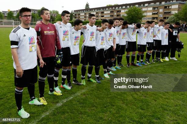 Team-mates, friends and relatives gather to remember Diren Dede at his football club, SC Teutonia 1910, on April 30, 2014 in Hamburg, Germany. German...