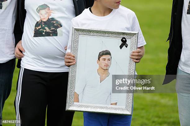 Team-mates, friends and relatives gather to remember Diren Dede at his football club, SC Teutonia 1910, on April 30, 2014 in Hamburg, Germany. German...