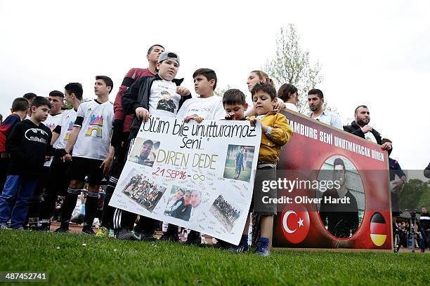 Team-mates, friends and relatives gather to remember Diren Dede at his football club, SC Teutonia 1910, on April 30, 2014 in Hamburg, Germany. German...