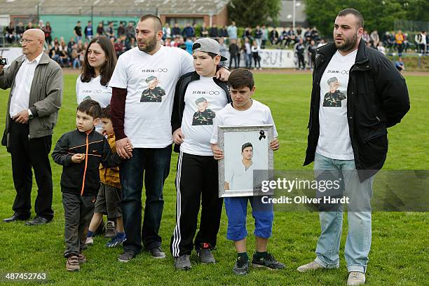 Team-mates, friends and relatives gather to remember Diren Dede at his football club, SC Teutonia 1910, on April 30, 2014 in Hamburg, Germany. German...