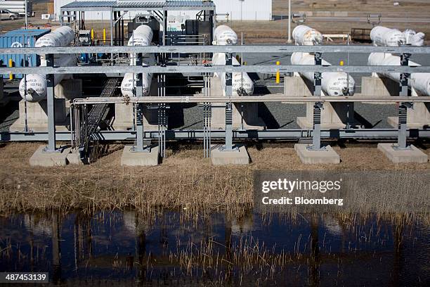 Helium storage tanks sit near the Mid-Atlantic Regional Spaceport launch Pad-0A at the National Aeronautics and Space Administration Wallops Space...