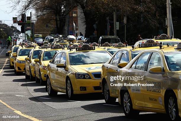 Taxi cars are lined up as protesters gather on September 10, 2015 in Melbourne, Australia. Tram drivers are striking for over a pay dispute between...