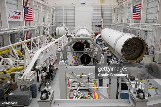 Antares rockets sit inside the Orbital Sciences Corp. Horizontal integration facility at the National Aeronautics and Space Administration Wallops...