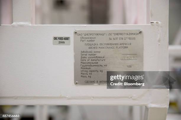 Ladder made in the Ukraine stands inside the Orbital Sciences Corp. Horizontal integration facility at the National Aeronautics and Space...