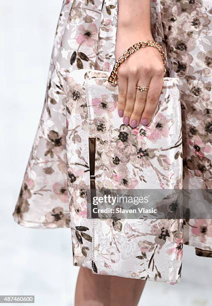 Model, purse detail, walks the runway at the LC Lauren Conrad fashion show during New York Fashion Week Spring 2016 at Skylight Modern on September...