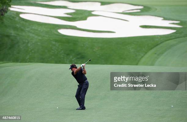 Phil Mickelson hits a shot during the pro-am at Quail Hollow Club on April 30, 2014 in Charlotte, North Carolina.