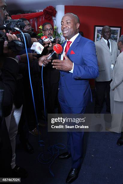 Brian Lara , former captain of the West Indian Cricket team, speaks to journalists at the swearing-in ceremony for the new Prime Minister of Trinidad...