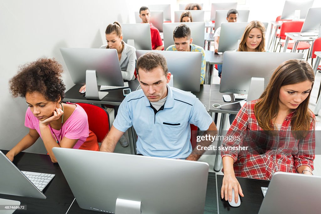 Large Group Of People Using Computer In A Computer Lab High-Res Stock ...
