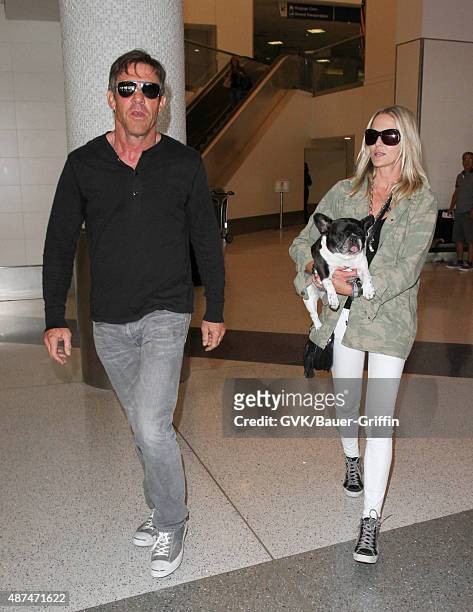 Dennis Quaid and Kimberly Quaid are seen at LAX. On September 09, 2015 in Los Angeles, California.