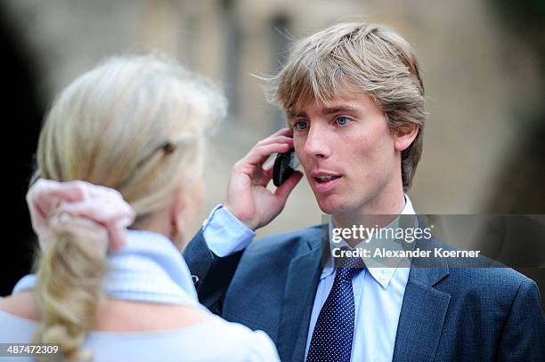 Prince Christian of Hanover is pictured talking on his phone during the official opening of the 'Der Weg zur Krone - Das Koenigreich Hannover und...