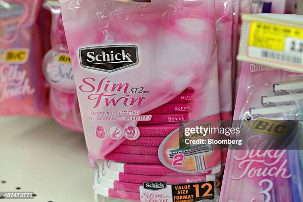 Energizer Holdings Inc. Schick brand razors sit on display in a supermarket in Princeton, Illinois, U.S., on Wednesday, April 30, 2014. Energizer...
