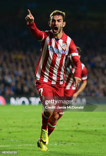 Adrian Lopez of Club Atletico de Madrid celebrates scoring his goal during the UEFA Champions League semi-final second leg match between Chelsea and...