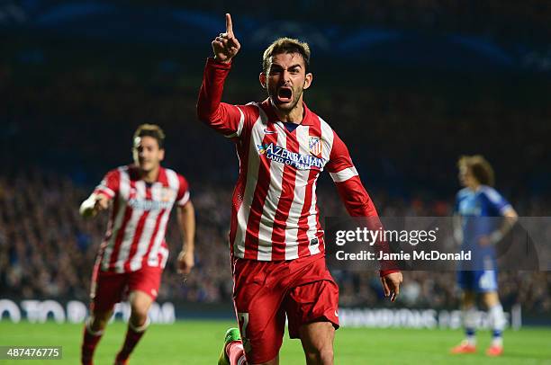 Adrian Lopez of Club Atletico de Madrid celebrates scoring his goal during the UEFA Champions League semi-final second leg match between Chelsea and...