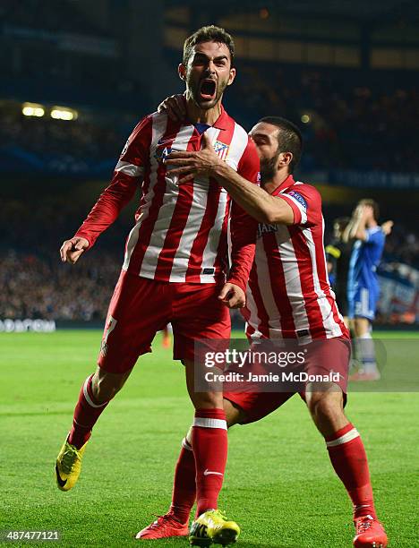 Adrian Lopez of Club Atletico de Madrid celebrates scoring his goal during the UEFA Champions League semi-final second leg match between Chelsea and...