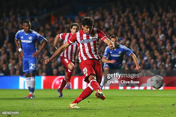 Diego Costa of Club Atletico de Madrid scores from the penalty spot during the UEFA Champions League semi-final second leg match between Chelsea and...