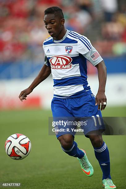 Fabian Castillo of FC Dallas pushes the ball upfield against Toronto FC at Toyota Stadium in Frisco on April 19, 2014 in Frisco, Texas.