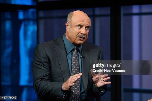 Dr Phil visits "Extra" at Universal Studios Hollywood on September 9, 2015 in Universal City, California.