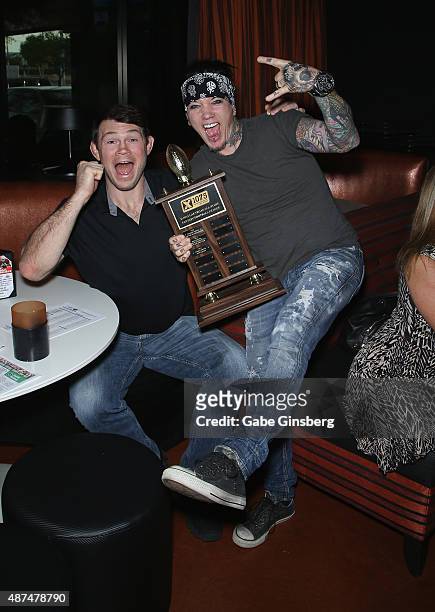 Former mixed martial artist Forrest Griffin and guitarist Dj Ashba of Sixx:A.M. Attend Touchdown for Charity's celebrity fantasy football draft at...