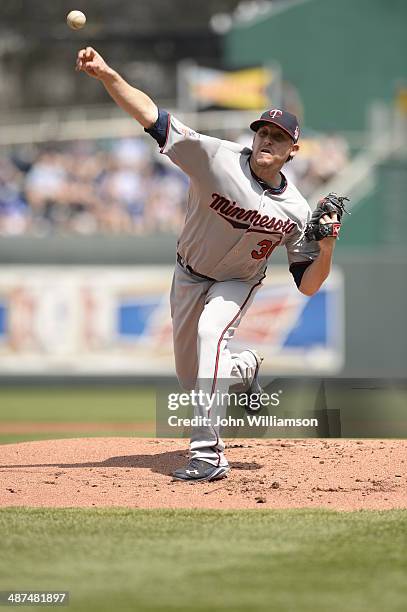 Kevin Correia of the Minnesota Twins pitches against the Kansas City Royals on April 19, 2014 at Kauffman Stadium in Kansas City, Missouri. The...
